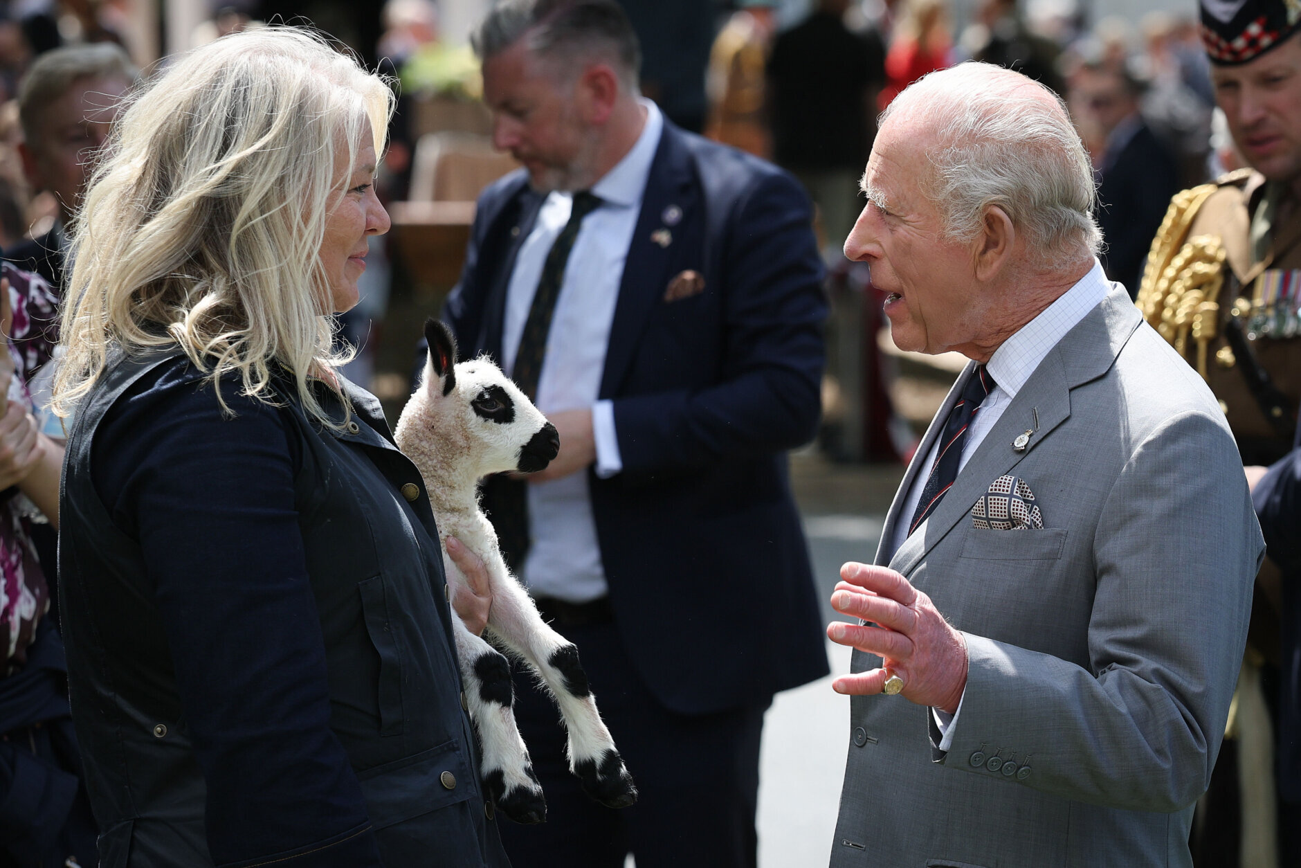 A Kerry Hill Welsh lamb named Upperville Charles, which was born last night, is shown to Britain's King Charles III by Tracey Bloom,