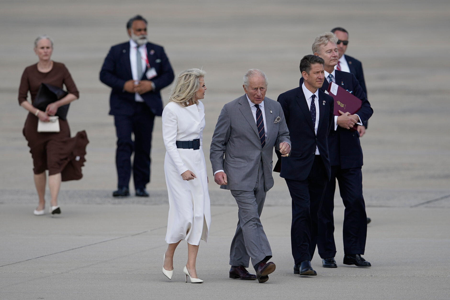 Britain's King Charles III walks from a helicopter before boarding his plane at Joint Base Andrews,