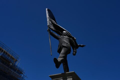 Banksy confirms a new statue in central London of a man blinded by a flag is his work