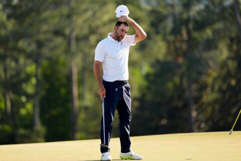 Scottie Scheffler falls a stroke short of a record Masters comeback after a flawless weekend