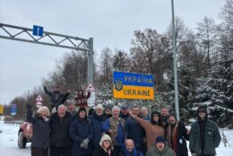 a group of people at the Ukraine border