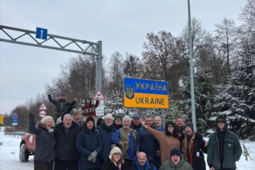 a group of people at the Ukraine border