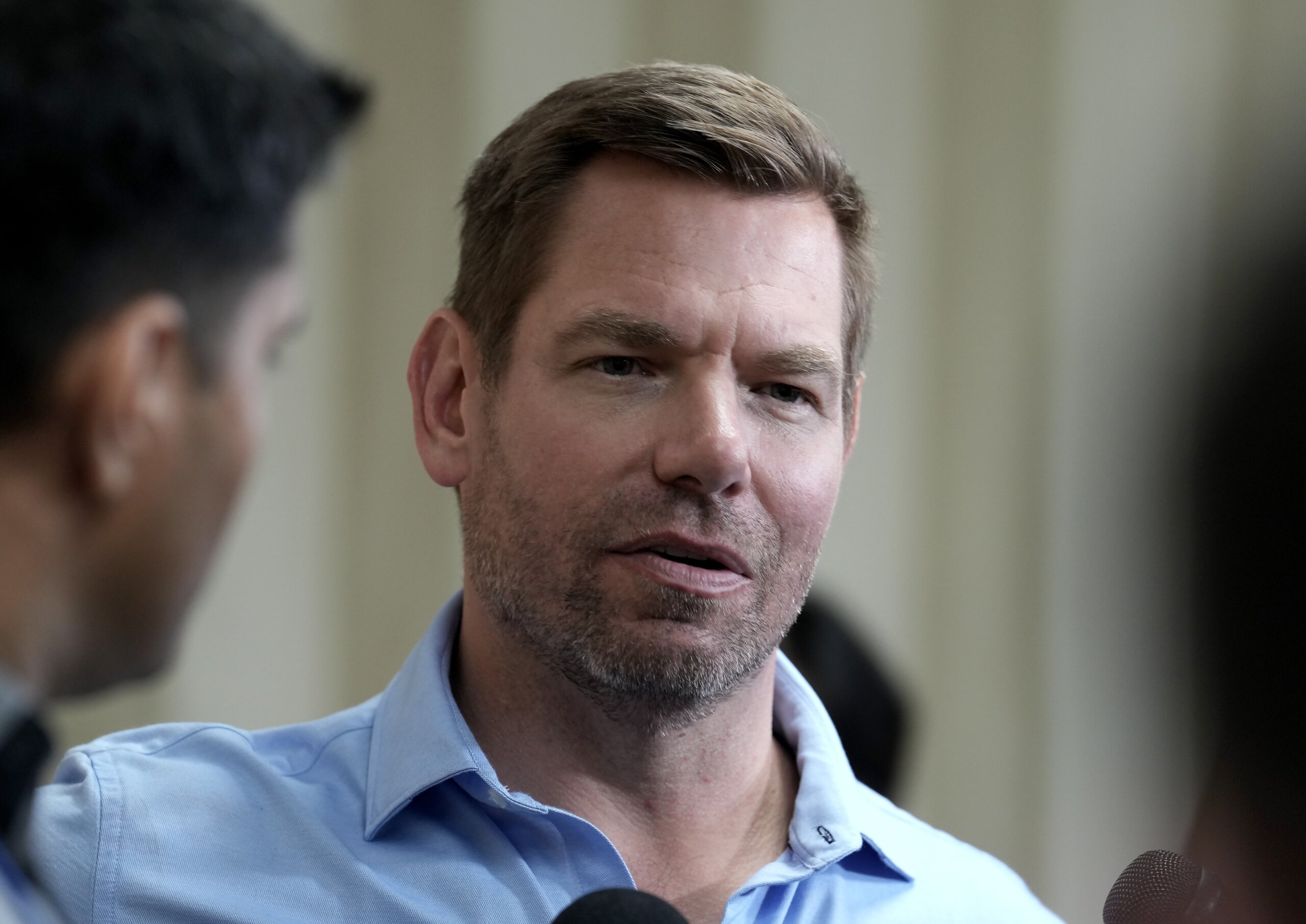 Former US Rep. Eric Swalwell placed on leave from U.Md. law school board