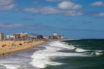 Ocean City, Maryland, USA Sept 3, 2024 People on the beach with big waves.