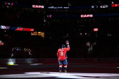 Alex Ovechkin of the Washington Capitals waves to the crowd after being named first star of the game after defeating the Pittsburgh Penguins 3-0 on April 12, 2026 at D.C.'s Capital One Arena. (Photo by Jamie Sabau/Getty Images)