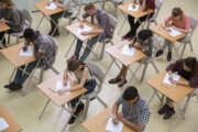 view of students taking test from above