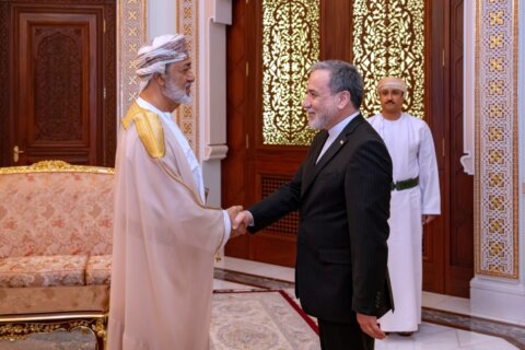 Iran’s top diplomat briefly returns to Pakistan but Trump says the sides can talk by phone