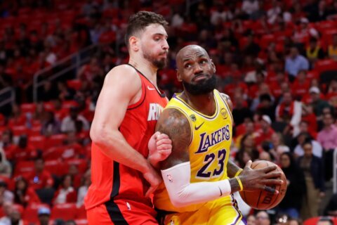 James makes tying 3 as Lakers storm back late, win in OT and take a 3-0 series lead over the Rockets
