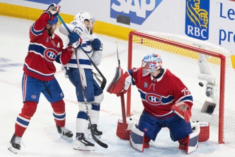 Hagel scores twice in 3rd, Lightning beat Canadiens 3-2 in Game 4 to tie series