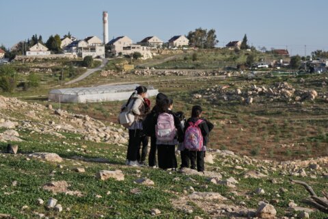 Israeli settlers block Palestinian kids’ path to school with tear gas and barbed wire