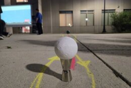 Moon-Earth distance scale model set up near viewing screen.