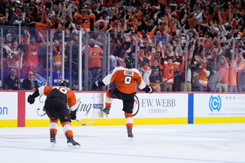 Cam do! Flyers are sky high after York scores OT winner, launches stick into stands and beat Pens