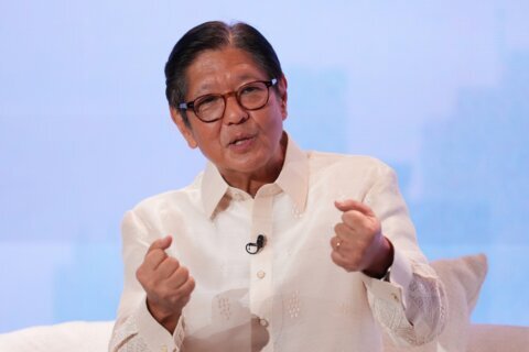 Philippine President Marcos debunks health rumors with jumping jacks