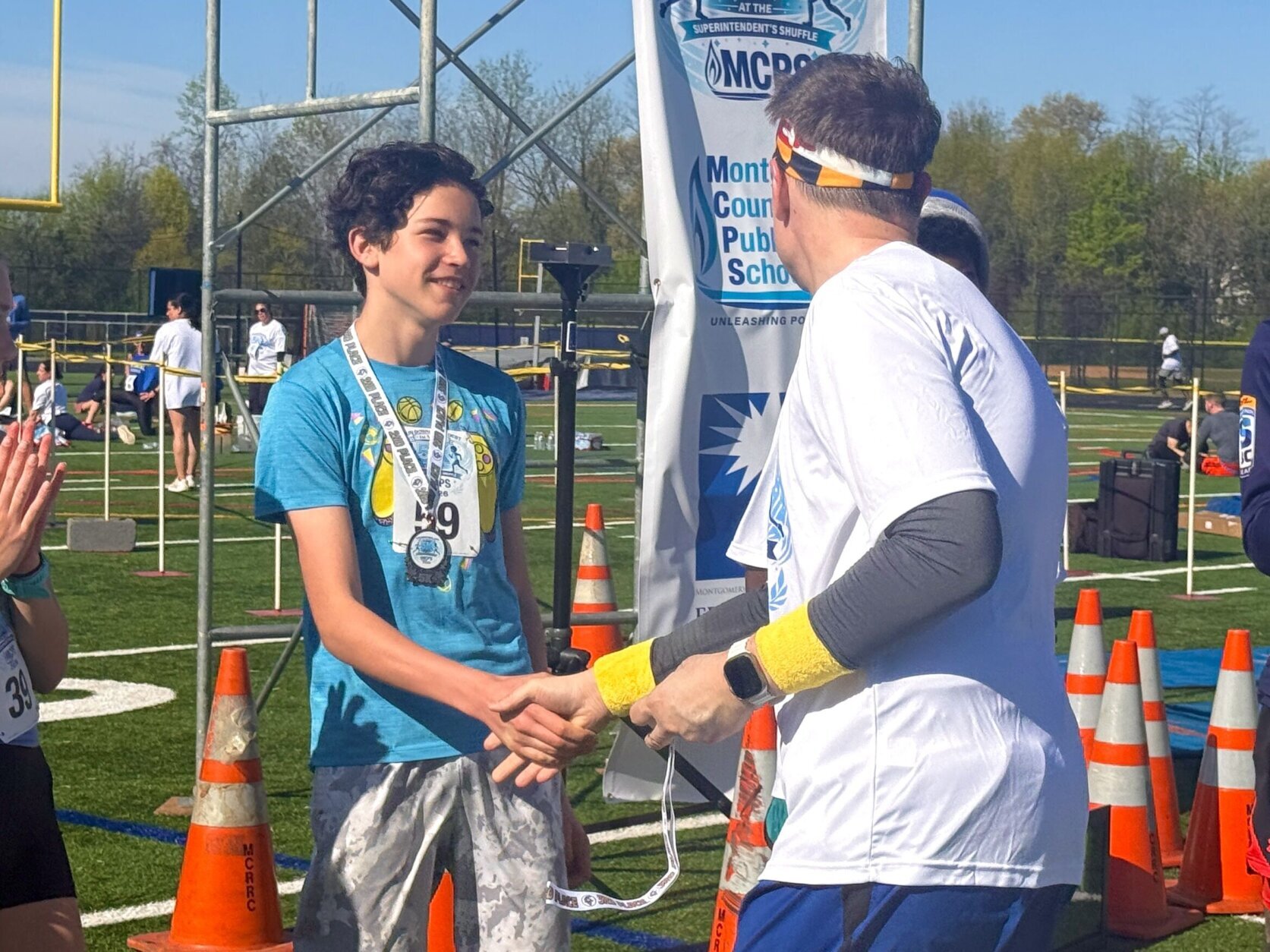 Congratulating student after race.