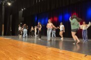 students dancing on stage