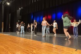 students dancing on stage