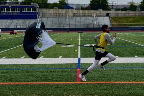 Student running a drill at clinic