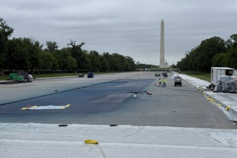 Crews begin resurfacing DC’s Reflecting Pool to become ‘American flag blue’