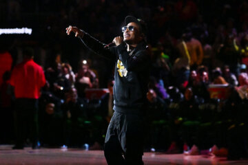 Rapper T.I. performs at halftime during the game