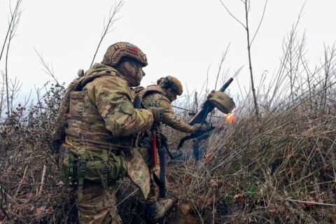 Russian aerial attacks kill 2 in Ukraine as Easter prisoner exchange planned