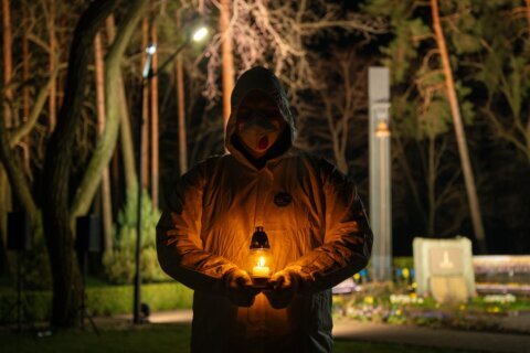 Despite Russia’s war, one Ukrainian city still gathers for midnight Chernobyl vigil