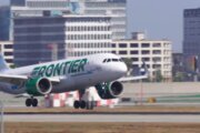 At Los Angeles International Airport, a Frontier plane full of passengers nearly collided with two trucks, according to the pilots, who said they had to slam on the brakes. Tom Hanson explains how the incident unfolded.