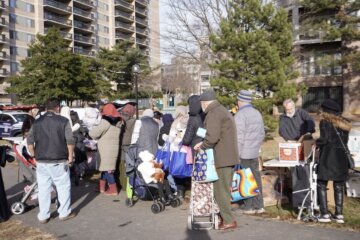 People lined up for assistance