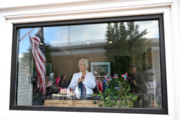 Tammy Carr looks out at the line for a parade and block party event on the final day of the state visit of King Charles III and Queen Camilla on April 30, 2026 in Front Royal, Virginia.
