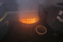 window of basement glows orange