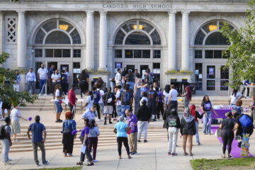 Students begin to arrive at Cardozo Education Campus for the first day of school for public schools in Washington, Monday, Aug. 25, 2025. (AP Photo/Pablo Martinez Monsivais)