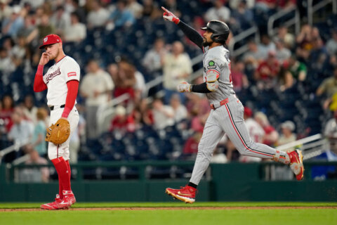 Buxton hits 3-run HR, Bradley has 8 strikeouts to help Twins beat Nationals 11-3
