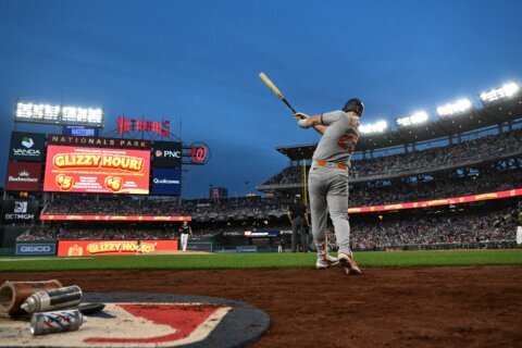 Lile hits another homer, Littell throws 5 scoreless as Nationals hang on to beat Orioles 3-2