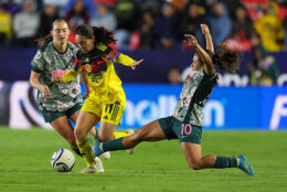 Leicy Santos of The United States' Washington Spirit, right, challenges Aylín Aviléz of Mexico's America during the Women's CONCACAF Champions Cup final soccer match in Pachuca, Mexico, Saturday, May 23, 2026.(AP Photo/Fernando Llano)