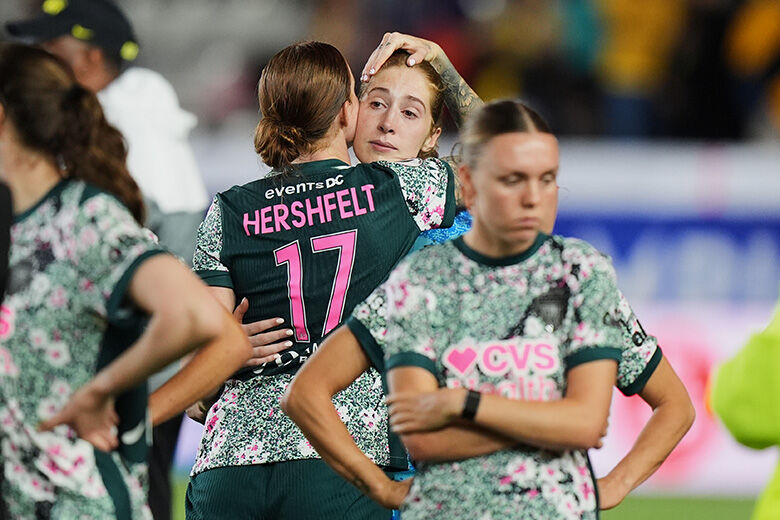 Hal Hershfelt comfort her teammate Sandy MacIver of The United States' Washington Spirit, after losing against Mexico's America during the Women's CONCACAF Champions Cup final soccer match in Pachuca, Mexico, Saturday, May 23, 2026.(AP Photo/Fernando Llano)