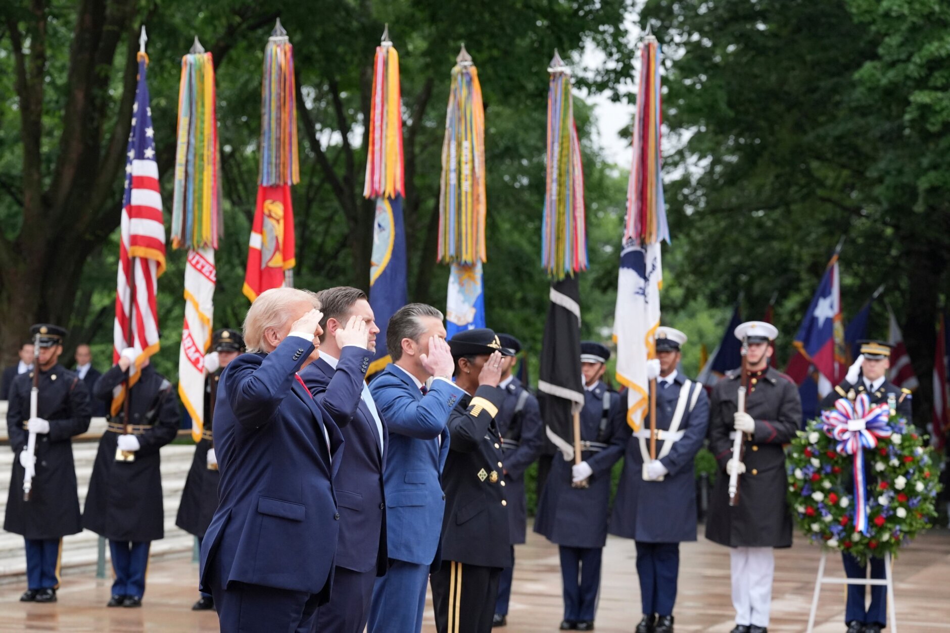 President Donald Trump salutes alongside Vice President JD Vance, Secretary of Defense Pete Hegseth and Maj. Gen. Antoinette Gant, commanding general of the Joint Task Force-National Capital Region and the U.S. Army Military District of Washington