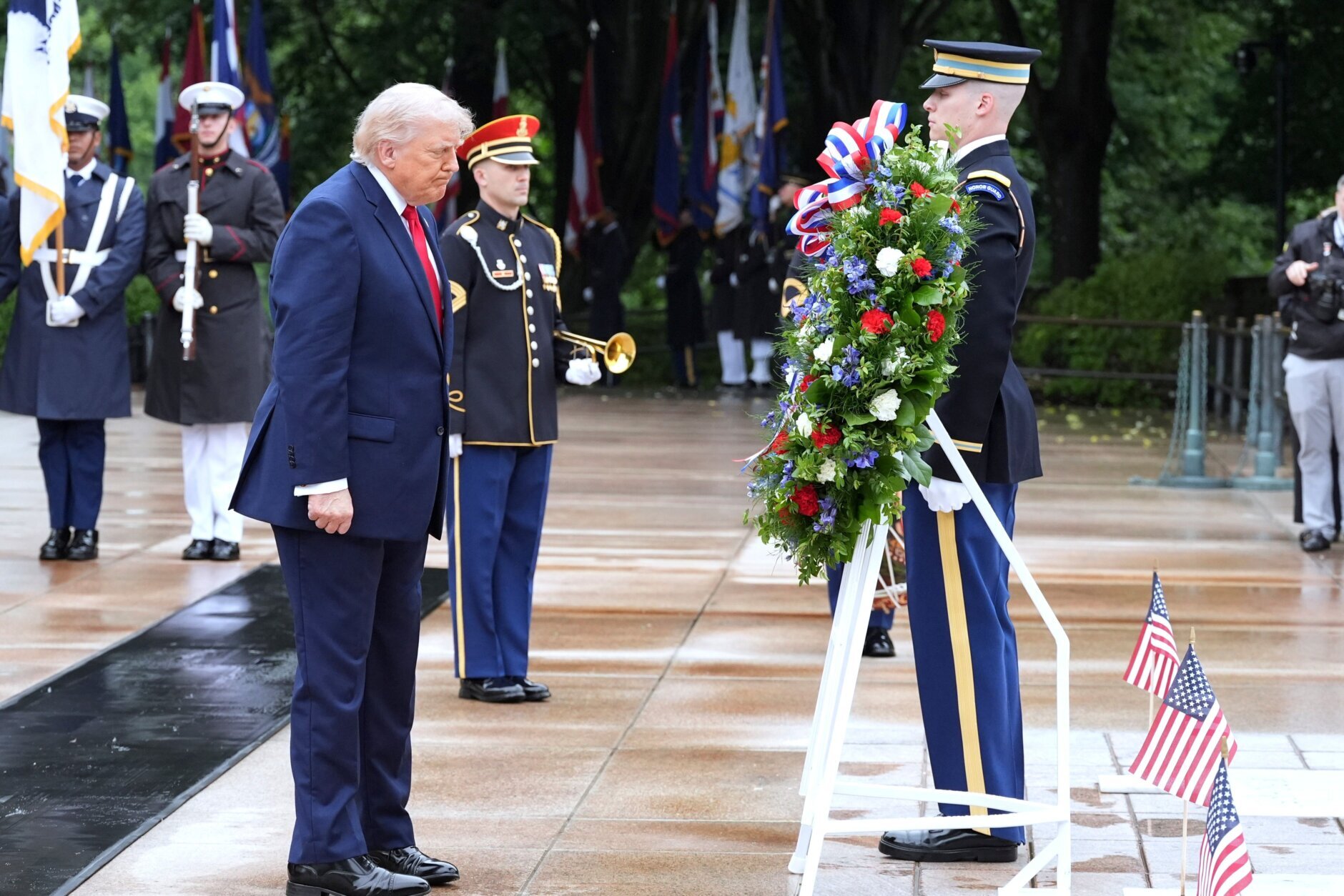 President Donald Trump places a wreath at the Tomb of the Unknown Soldier in Arlington National Cemetery