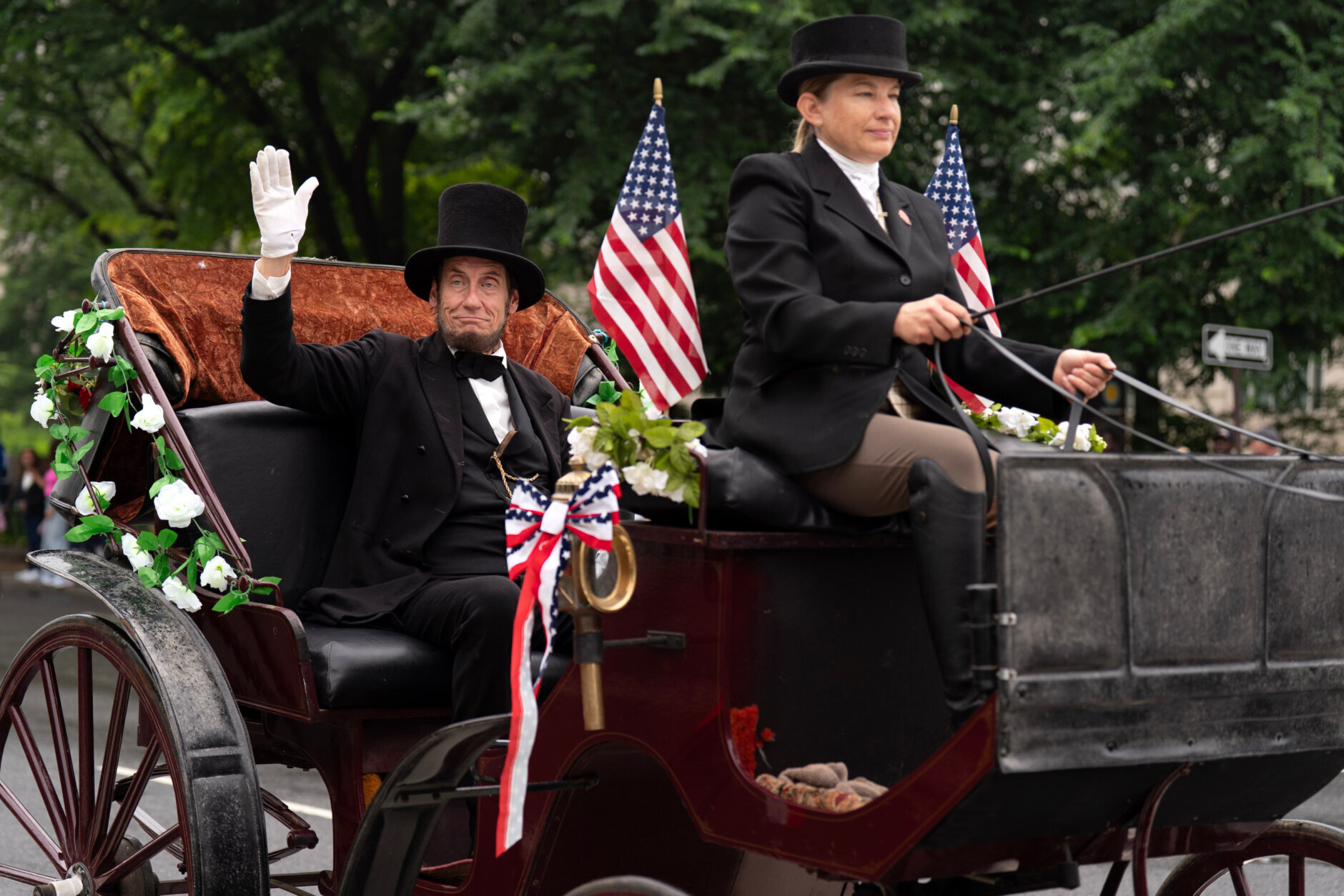 A participant dressed as Abraham Lincoln parade