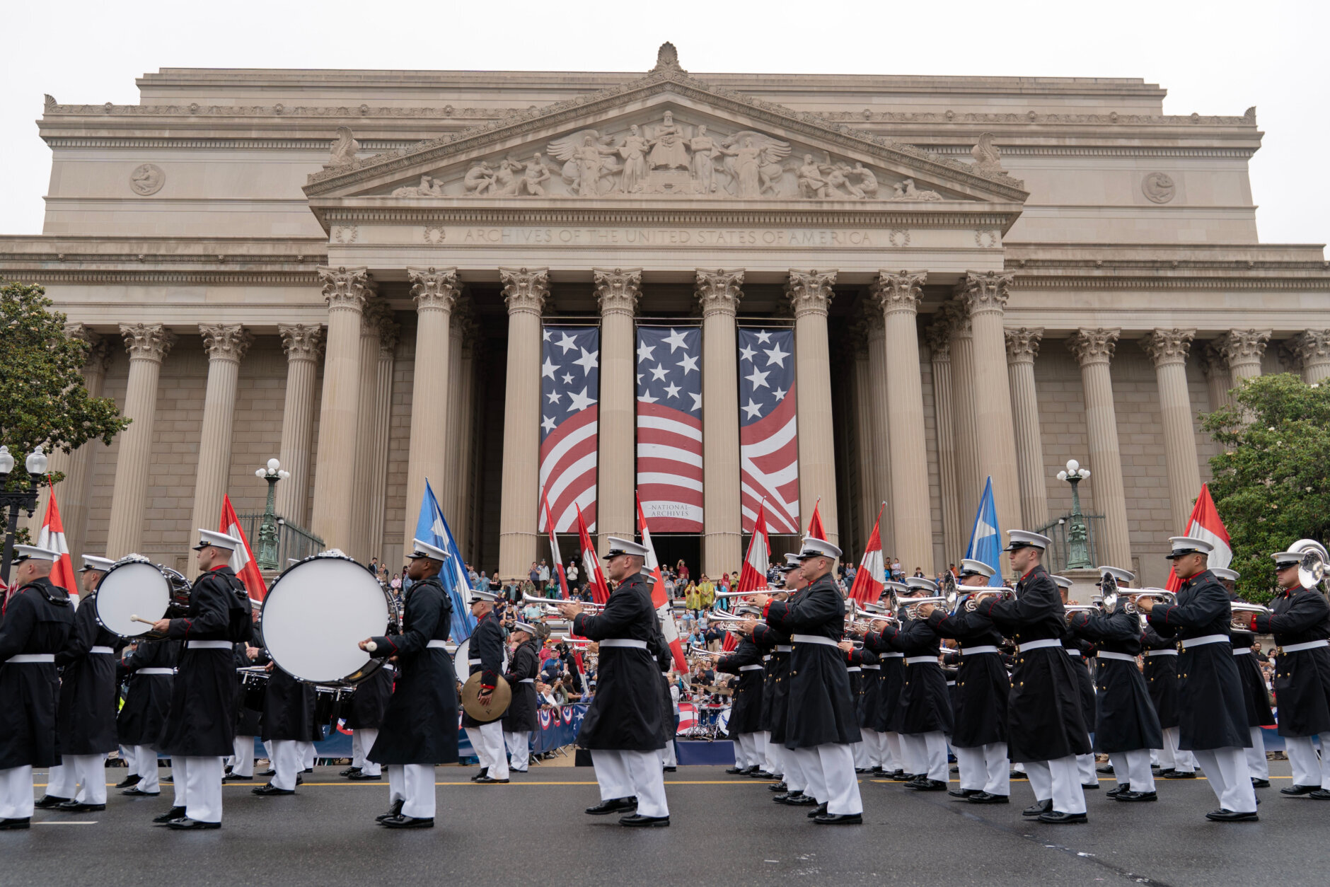Parade participants march near the National Mall along Constitution Avenue in Washington to commemorate Memorial Day,