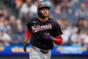 Washington Nationals' James Wood watches his home run in the second inning of a baseball game against the Cleveland Guardians in Cleveland, Tuesday, May 26, 2026. (AP Photo/Sue Ogrocki)