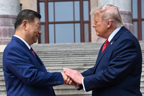 APTOPIX China Trump