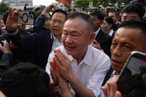 Thailand’s Thaksin released from prison after serving 8 months for abuse of power
