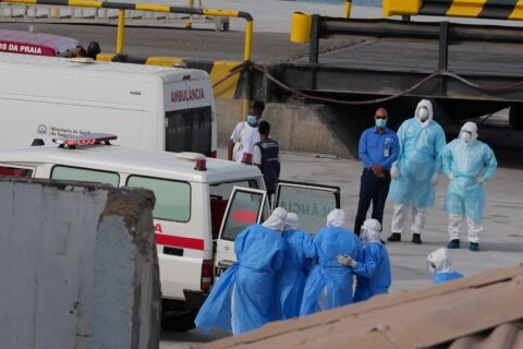 The Latest: Stricken cruise ship heads for the Canaries as authorities rush to identify contacts