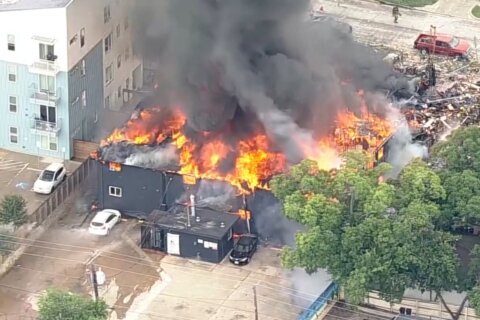 A large fire has erupted at an apartment complex in Dallas