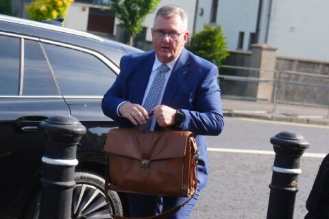 Northern Ireland’s former unionist leader faces trial in sexual abuse case involving 2 girls