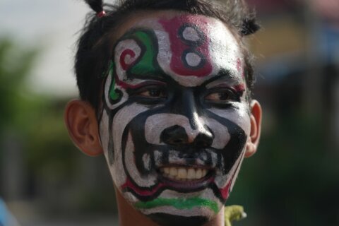 Cambodian villagers honor guardian spirits to pray for rain and good fortune