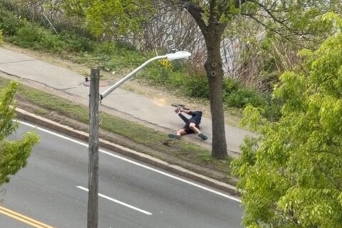 Man with an assault rifle sprays rounds at drivers near Boston, wounding 2 before being shot
