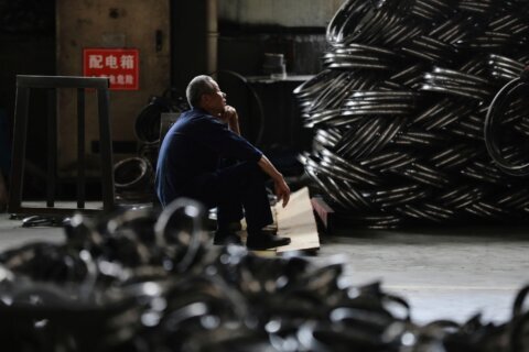 China’s factory activity slows in May, raising questions over its economy
