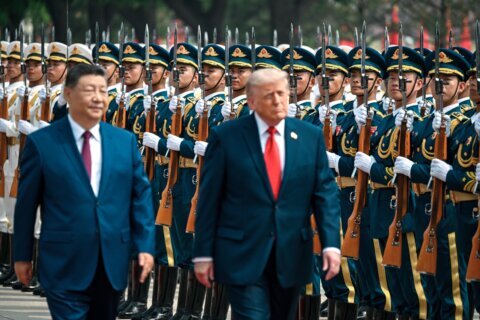 The Latest: Trump wraps up China visit and holds private meeting with Chinese leader Xi Jinping