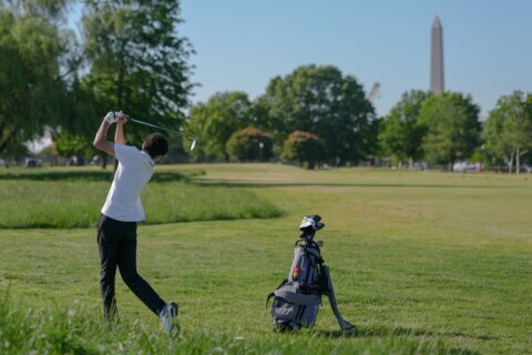 Judge in dispute over Washington golf course tells Trump officials not to cut trees without notice