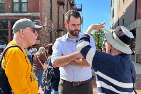 Iowa Democrats hoping to flip a US Senate seat are torn over which of 2 hopefuls has the best shot